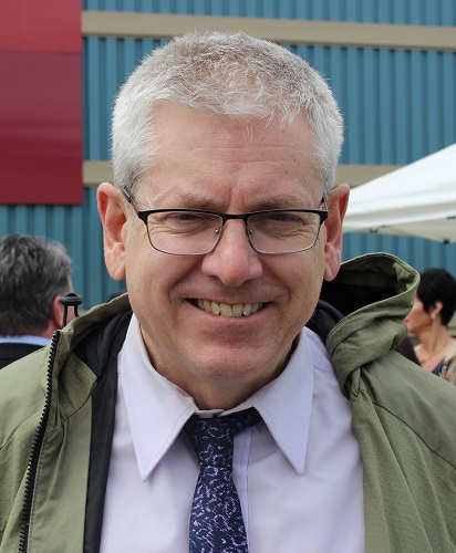 Angus smiling about his parliamentary accomplishments in the recent session