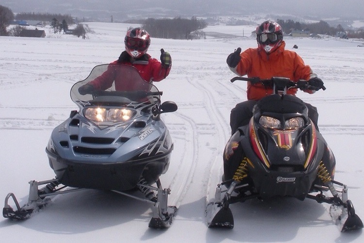 Snowmobiles shattering the silence at Cadence Residence
